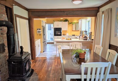 41 Summit Rd dining table into kitchen