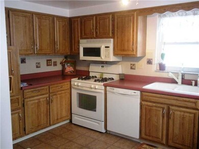 Kitchen. Lovely cabinetry and breakfast counter fo