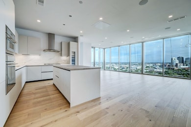 Kitchen features Pedini Italian cabinets, porcelai