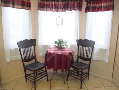 Dinette by the bay window in the eat-in kitchen.
