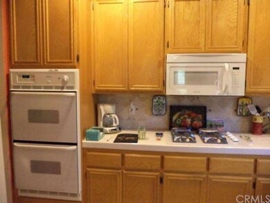 Kitchen double self cleaning oven, cooktop, and bu