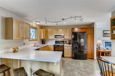 Kitchen, dining, laundry, and a 1/2 bath on the ba