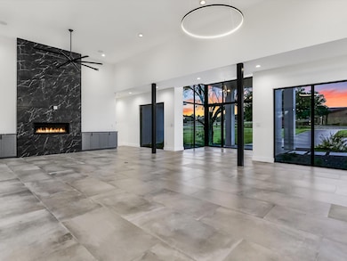 Unfurnished living room featuring recessed lightin