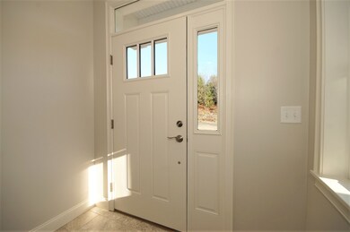 Foyer with upgraded TILE