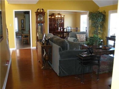 Other view of Den shows how it opens up to dining 