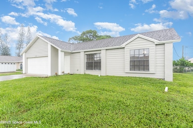 1791 Macklin St NW, Palm Bay, FL 32907 - photo 2