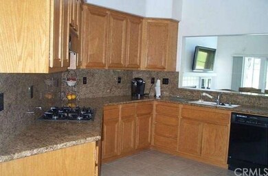 KITCHEN WITH GRANITE COUNTER TOPS