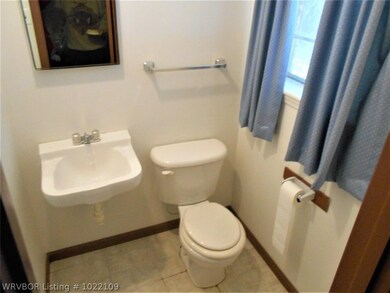 1/2 Bath in Master Bedroom.