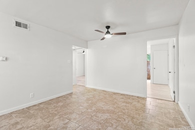 Open concept living/dining-room leading to bedroom