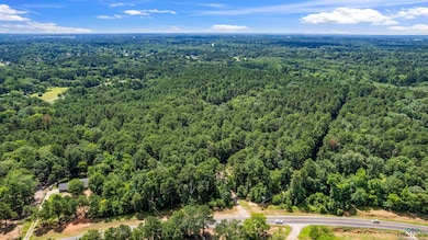 Aerial view of a heavily wooded area