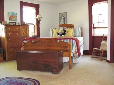 Carpeted bedroom with original...