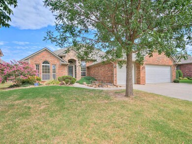 Single story home featuring a garage and a front l