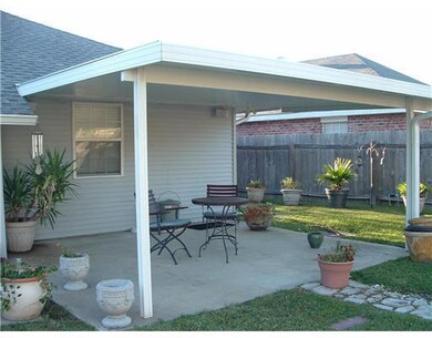 Patio/Deck. Large covered patio. Window is from Ma