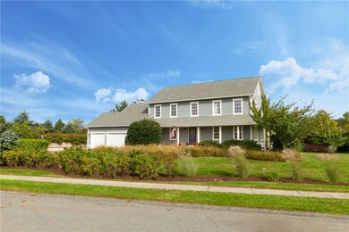 Three car garage, professionally landscaped, wrap-