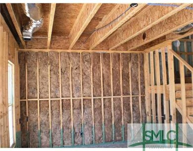 Other. LIVING ROOM DURING FRAMING AND INSULATION