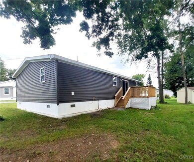 Rear of Home with Decking and stairs.