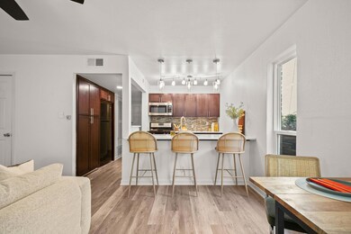 The breakfast bar is the perfect spot to grab a quick bite or chat with friends while you cook