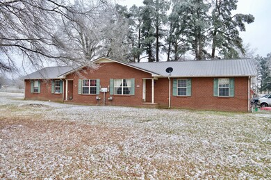 Two duplexes and an extra lot. Build another unit if you like.