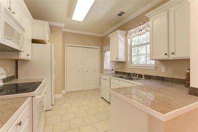 Kitchen Features Granite Tile Counter Tops, Pantry