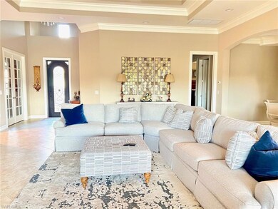 Tiled living room with ornamental molding