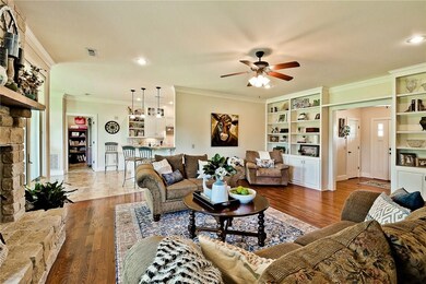 Natural Stone fireplace in this spacious living ro