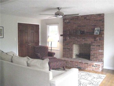Family Room. Brick fireplace,hardwood floors,large