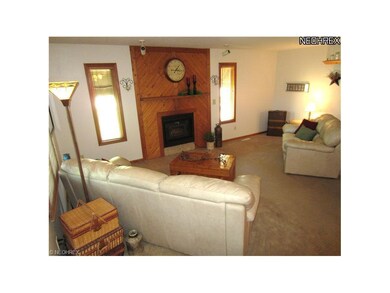 Large Family Room Features a Wood Burner with Blow