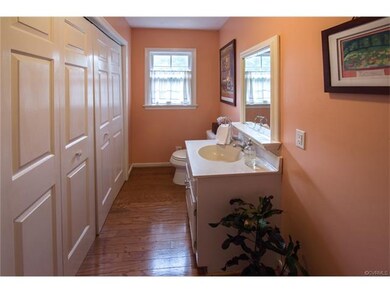 Half bath on first floor off kitchen.  Utility clo