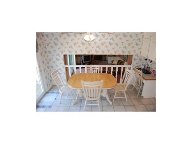 Eat-In Area of Kitchen with Tiled Flooring.