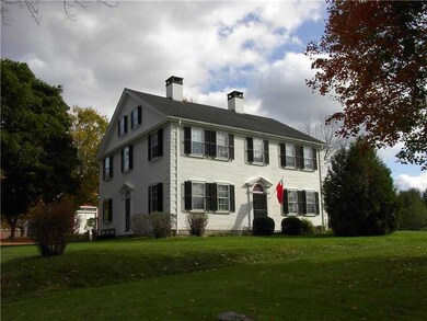 Exterior Front. West side of house...