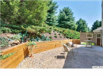 The retaining wall was just added to extend and de