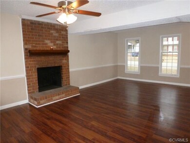 Brick Fireplace and hearth...chair railing and gor