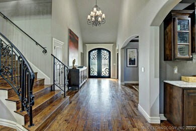 Double custom Iron Front doors grant access to a s