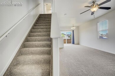 Entry and living room and dining area