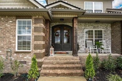 Perfect covered front porch for those mornings or evening porch sitting.