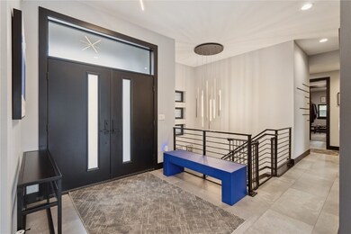 Custom hand made metal railing surrounding stairwa