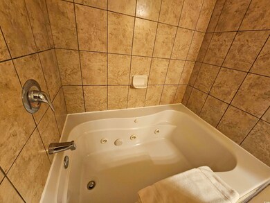 Bathroom featuring a whirlpool tub