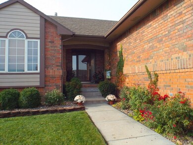 Welcoming front walk with abundant perennials