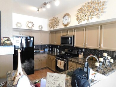 Kitchen view of freshly painted cabinets and brand