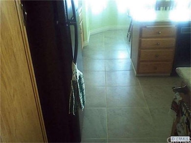 New tiles in kitchen and baths