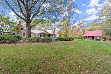 3 acre property with main house, guest house, 5 ca