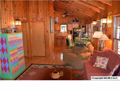 Open and flowing foorplan, great for entertaining or just relaxing. The exposed beams and vaulted ceiling really make the space feel huge.