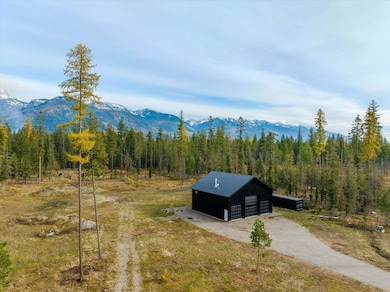 Mountain view featuring a heavily wooded area