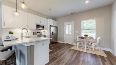 Quartz countertops and eating bar.