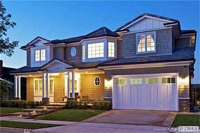 Front of home with driveway and front porch.