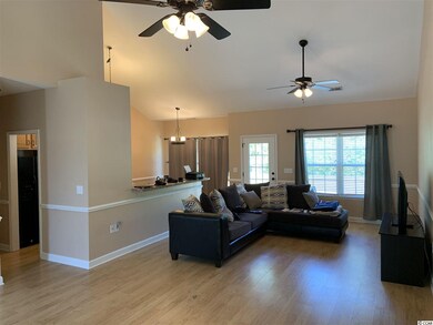 A generous living room with vaulted ceilings!