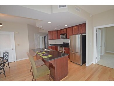 Kitchen opens to Living and Dining Rooms and has s
