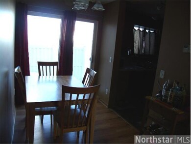 Generous dining area with attractive laminate floo