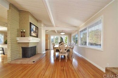 The Open Dining Room features a Large Fireplace an