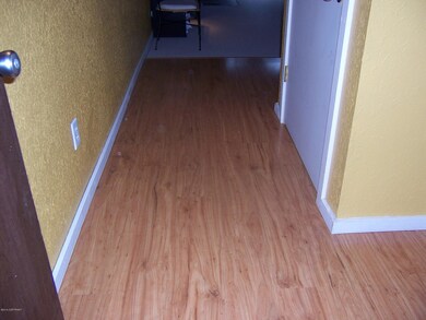 Laminate floor in entry & kitchen